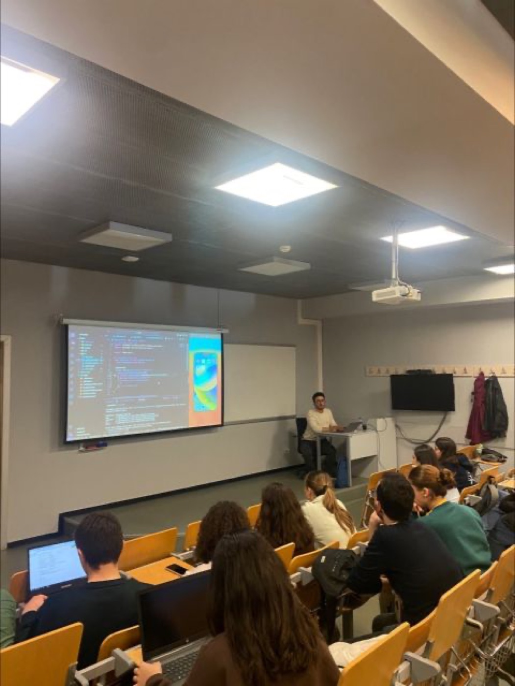 Eren Gün presenting Firebase Authentication in Flutter at Bahçeşehir University